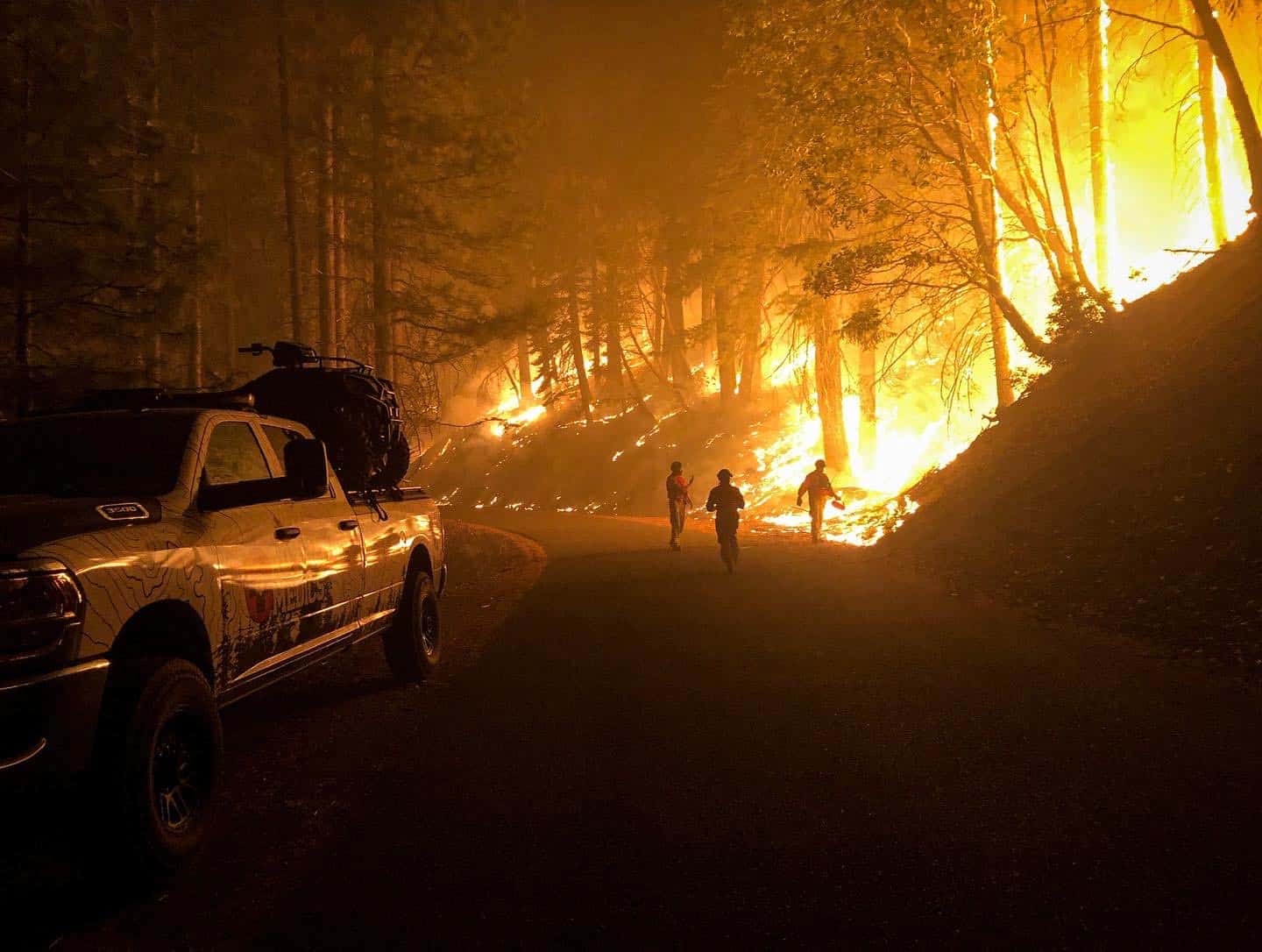 firefighters on side of road