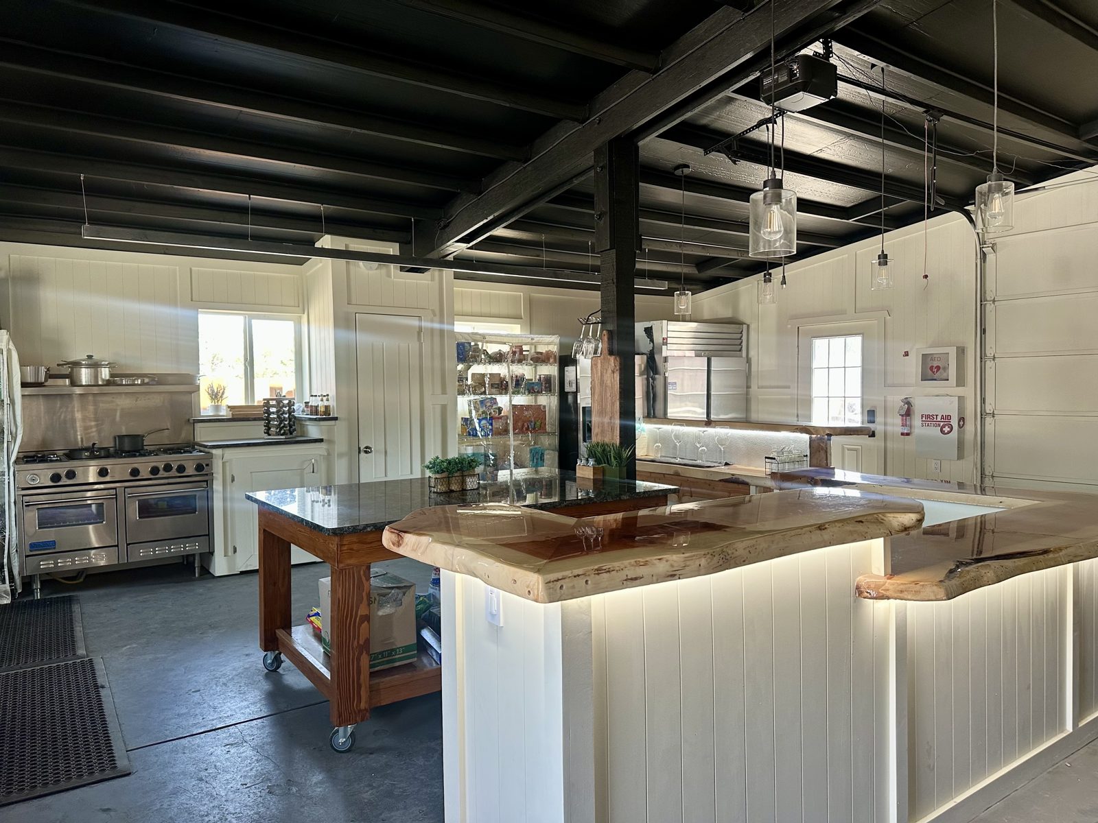 New commercial kitchen at Lava Rock Ranch near Bend, Oregon, with commercial range, refrigeration and live-edge counters, available to Adventure Medics Wilderness First Responder students during the nine-day course