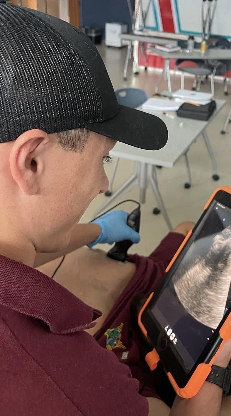 EMS student performing a cardiac point-of-care ultrasound scan during the Prehospital Ultrasound Academy in Bend, Oregon